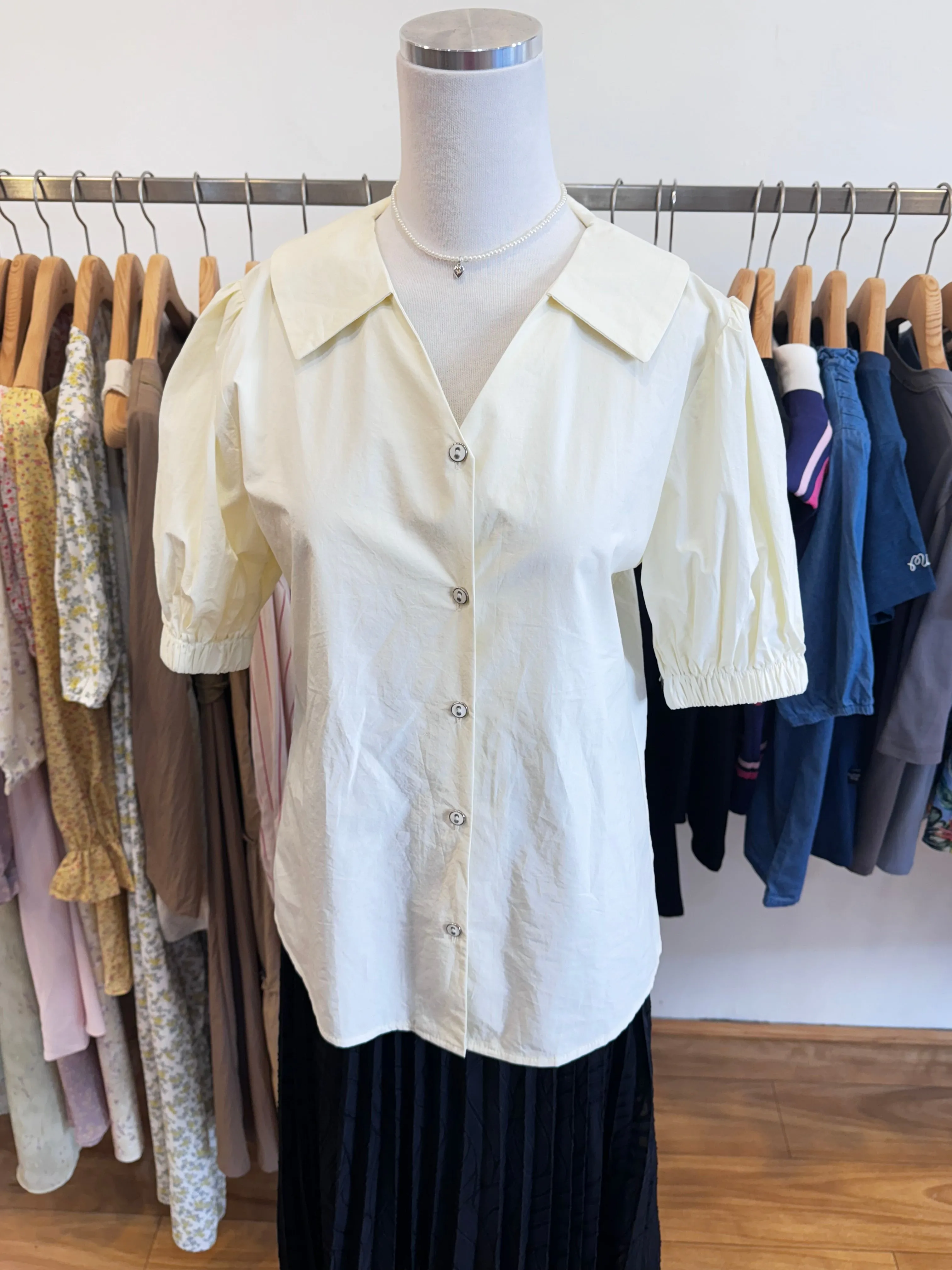 Cream short sleeve shirt