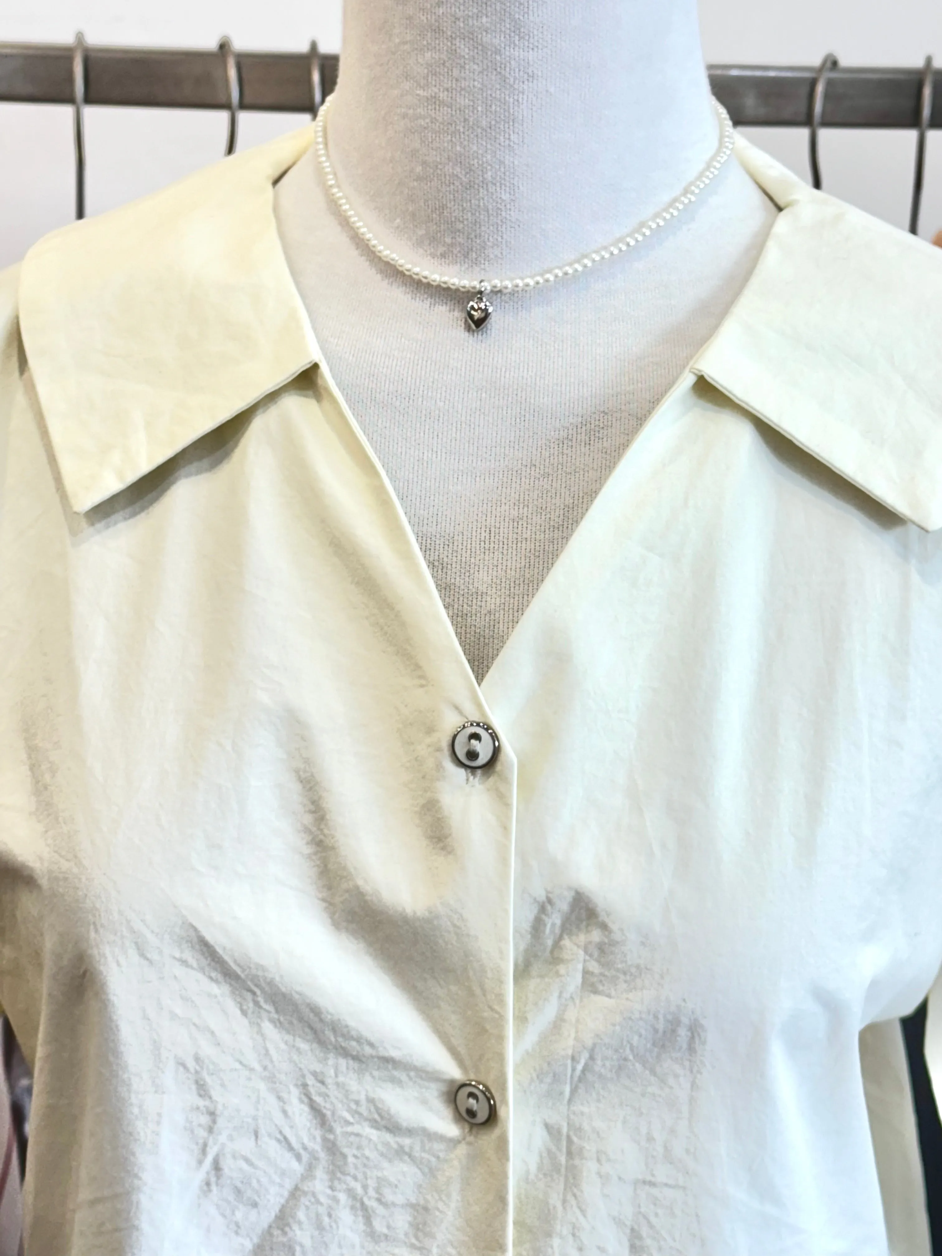 Cream short sleeve shirt