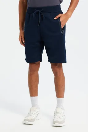 Men Navy Mid Rise Tech Shorts With Zip Pockets